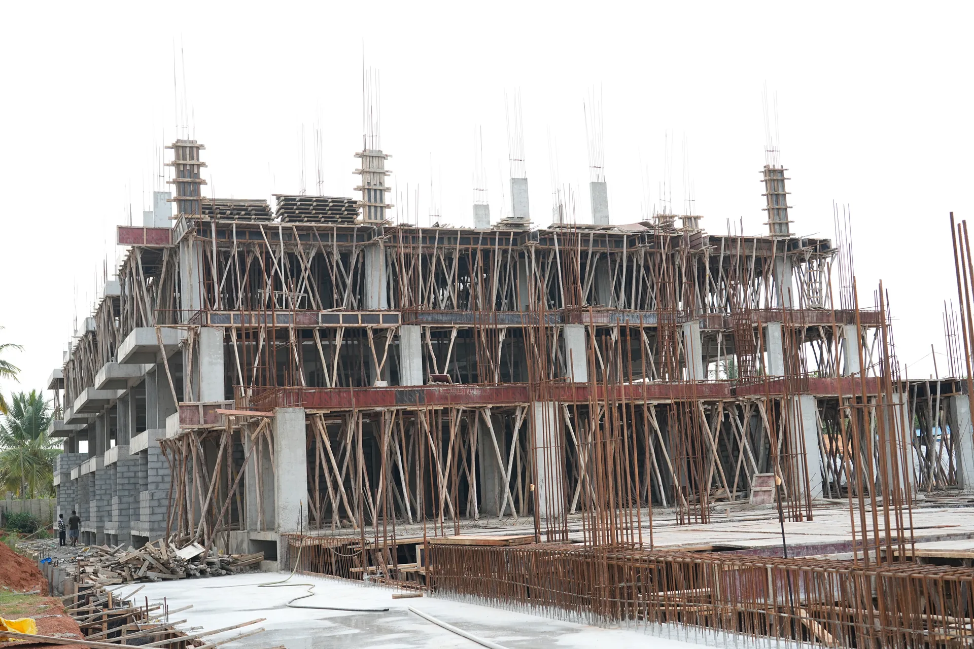 Reinforced concrete structure and slab formwork under construction at Sapthagiri Sampada