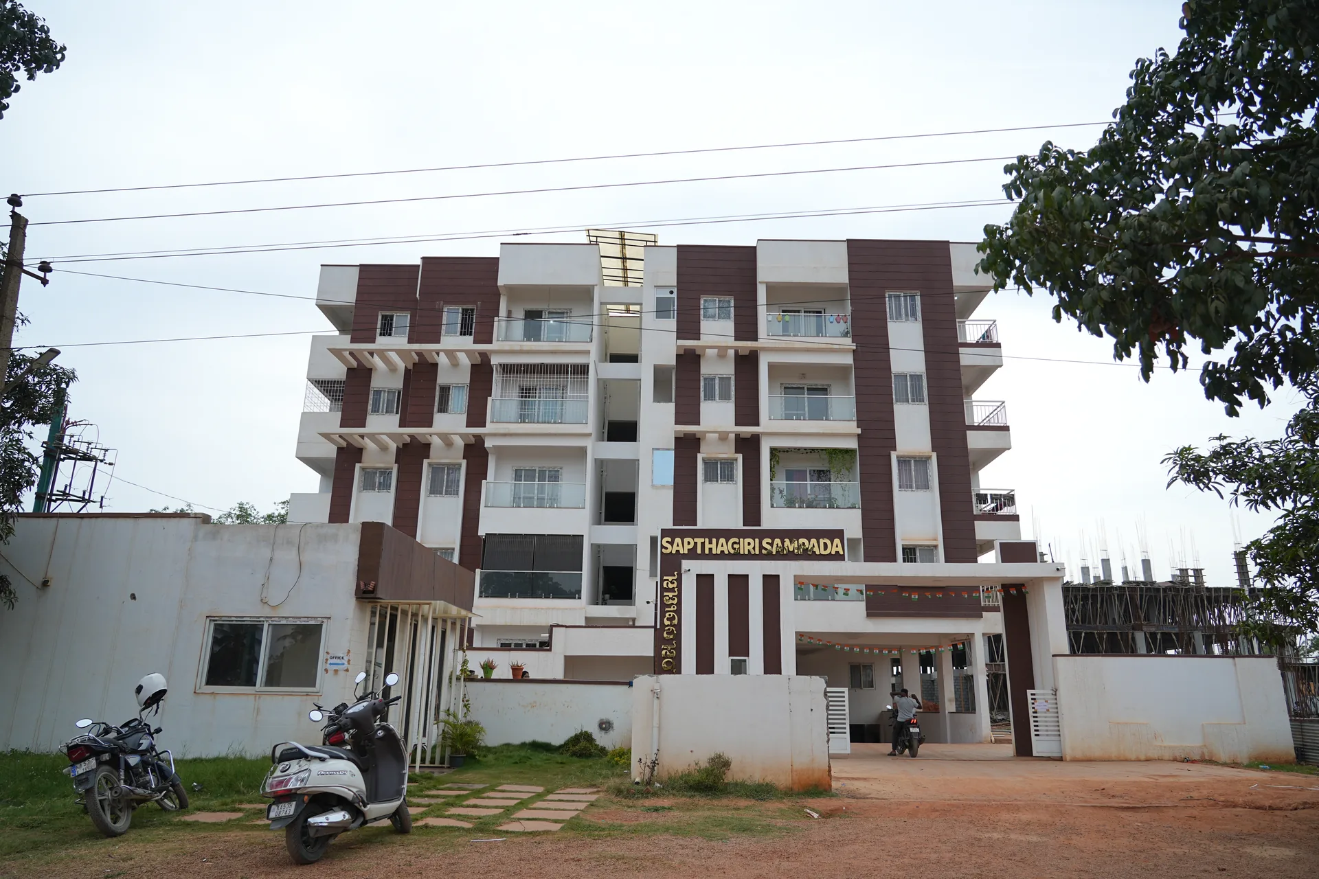 Completed Sapthagiri Sampada residential block viewed from the entrance